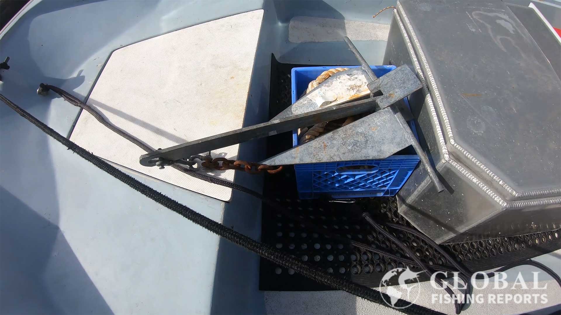 Danforth anchor and chain stored in an egg crate