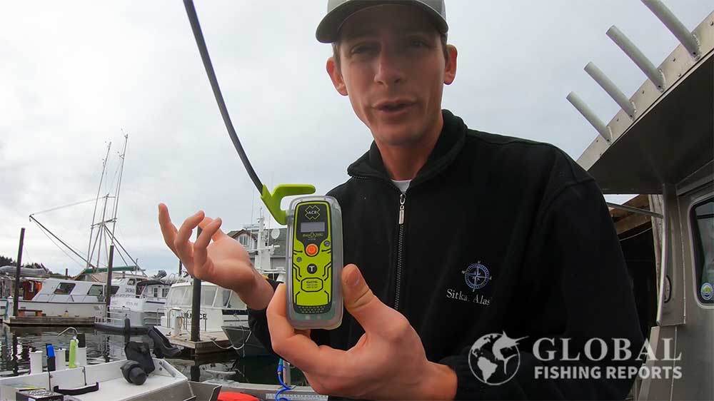 Captain Cody showing how PLBs work